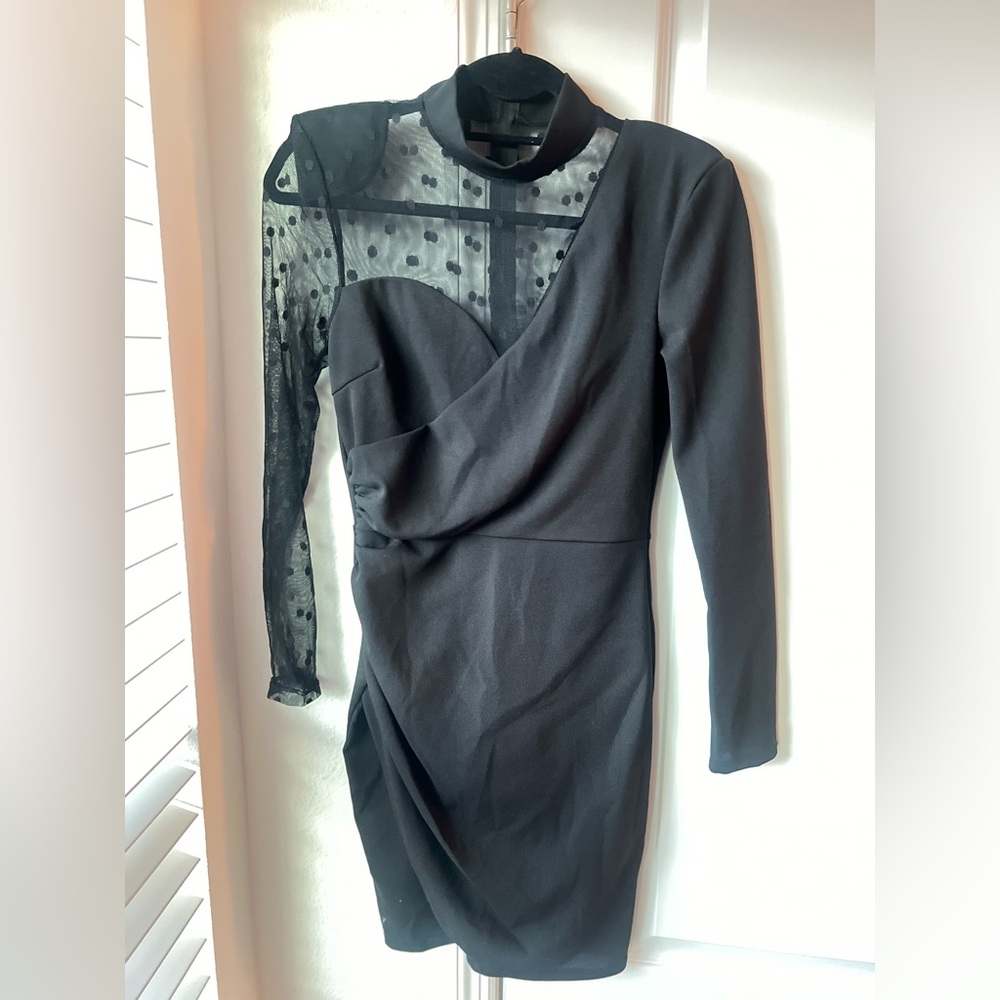 Black short dress with shoulder pads